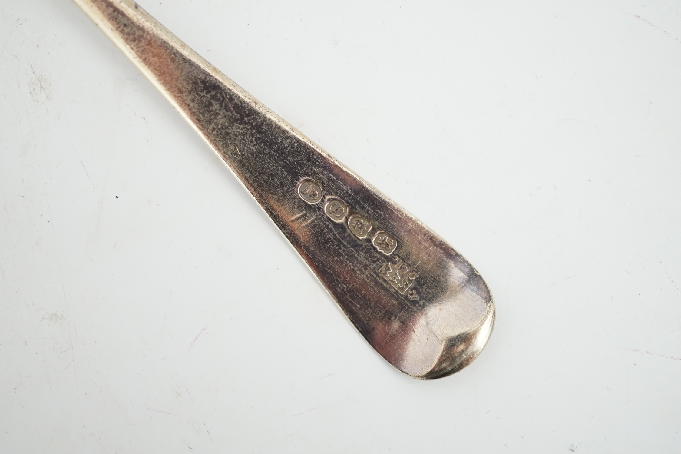 A harlequin collection of twenty mainly 19th century silver fiddle pattern dessert spoons, various dates and makers, together with fourteen similar Old English pattern dessert spoons, various dates and makers